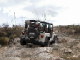 Jeep between rock and hard place