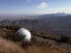 Looking west over a small telescope